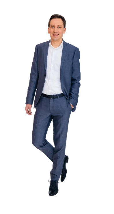Thomas Schuster in business attire